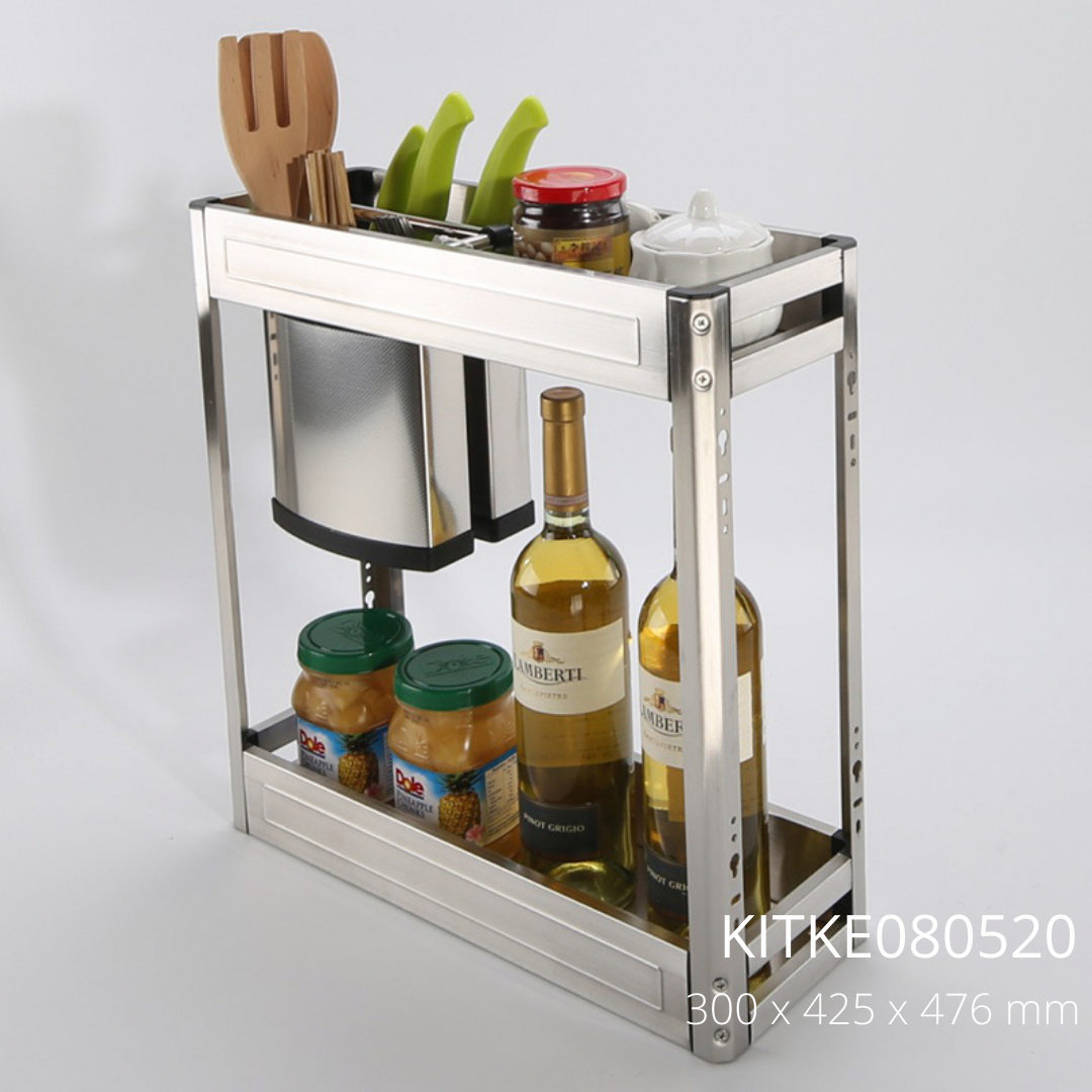 A pullout seasoning drawer made of stainless steel, shown extended and retracted, containing spices and kitchen tools.