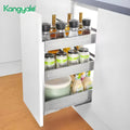 Kitchen cabinet with a pull-out spice rack containing various bottles and containers.