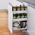 A pull-out cabinet organizer installed inside a kitchen cabinet, featuring multiple shelves with dishes and food containers.
