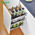 Kitchen cabinet with a pull-out organizer containing bottles and jars, branded 'Kangyale'.