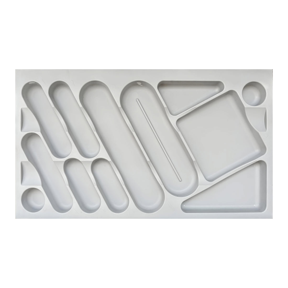 A custom fit cutlery tray in grey color with various compartments for organizing utensils.