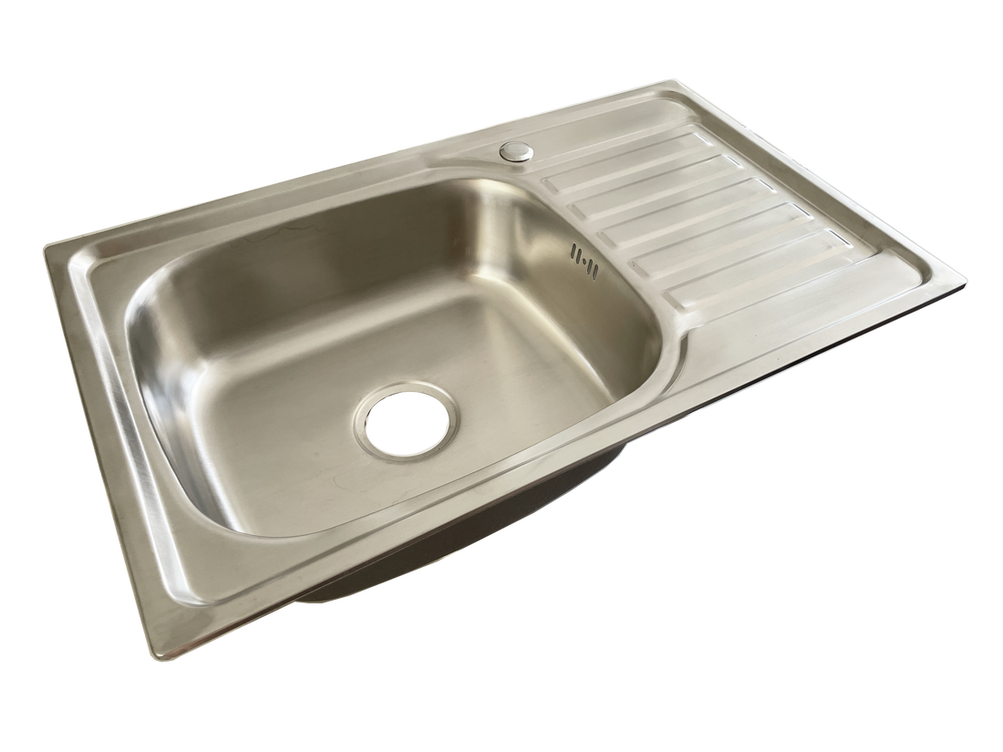A single bowl, sleek design stainless steel sink with a template and mounting hardware included.