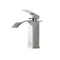 Stainless steel faucet on a white background