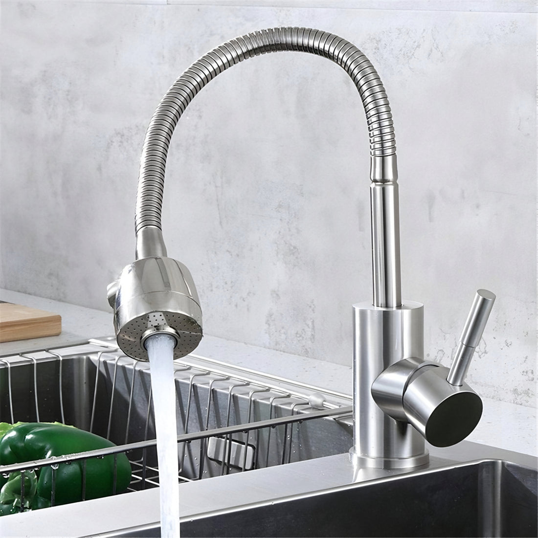 A silver-colored, flexible kitchen faucet with a swan neck design and a single handle.