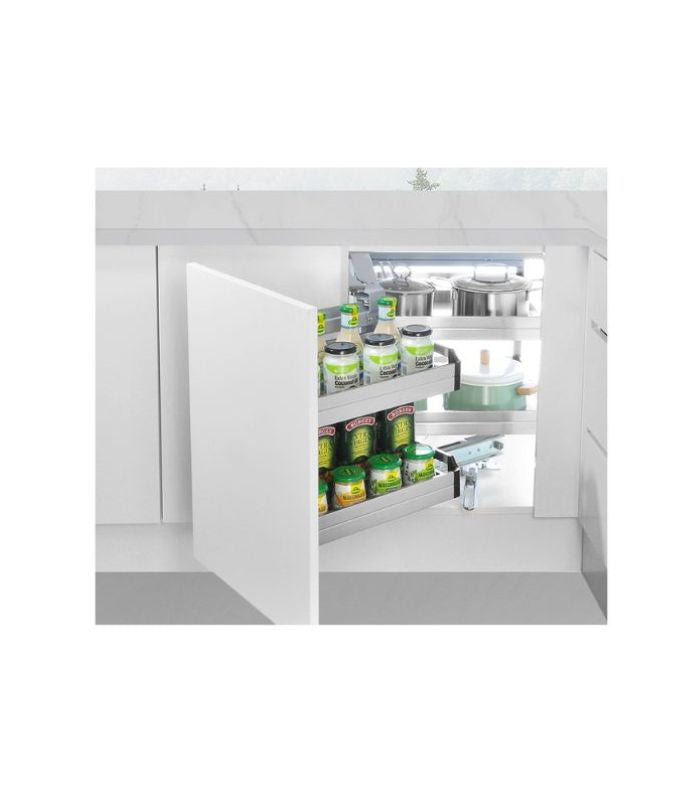 A white kitchen storage magic corner pullout, with shelves inside that contain kitchen items like pots and containers.