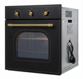 Black oven with gold handles on a white background
