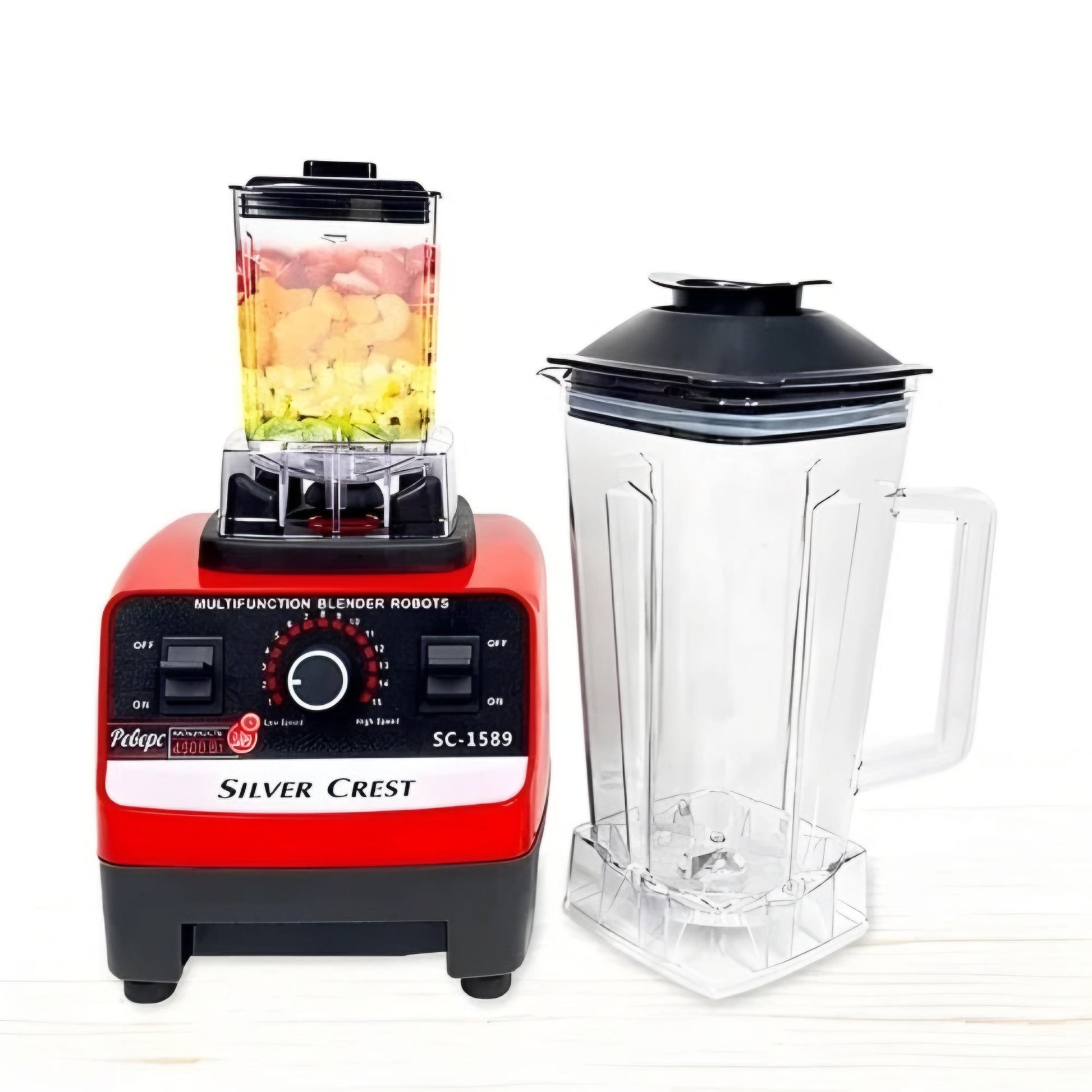 Silver Crest High Performance Multifunctional Blender with a red base and black controls, alongside a clear blender jar filled with ingredients.