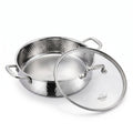 A stainless steel pot with a hammered exterior and a clear glass lid featuring a silver rim and handle, shown on a clean white background. The brand name 'VAKREEN' is visible on the glass lid.