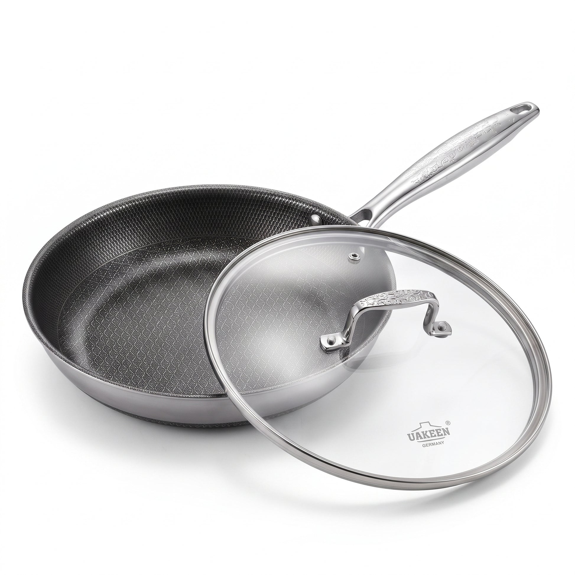 A stainless steel sauté pan with a textured non-stick interior and a clear glass lid with a stainless steel handle, shown on a white background. The brand name 'URACEN' is visible on the glass lid.