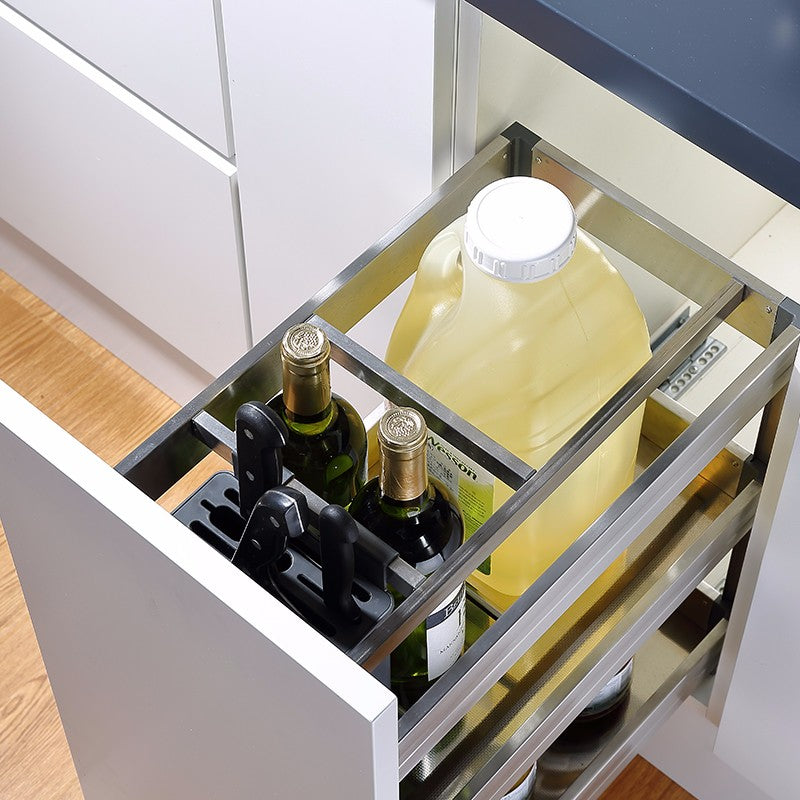 A stainless steel multi-purpose kitchen drawer basket organizer with multiple shelves, installed in a white kitchen cabinet.
